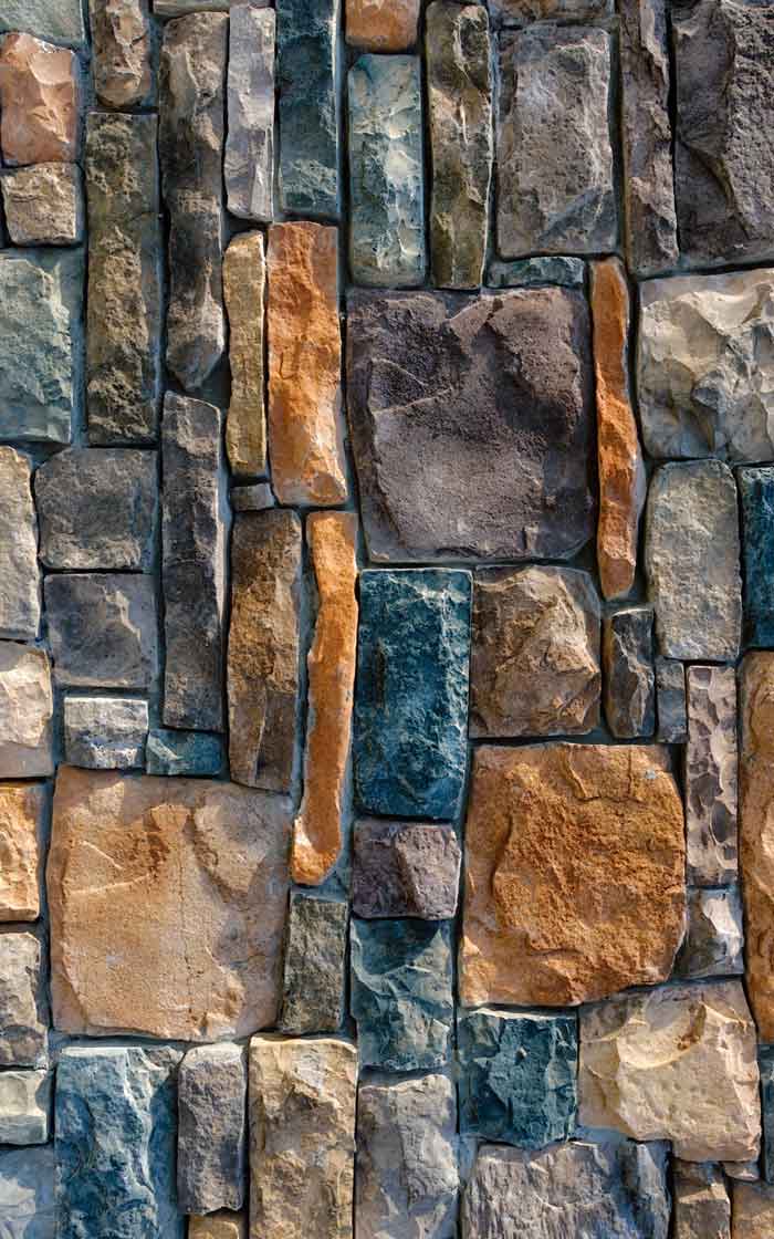 Close-up of the realistic rock and brick texture print on the natural stone door sticker