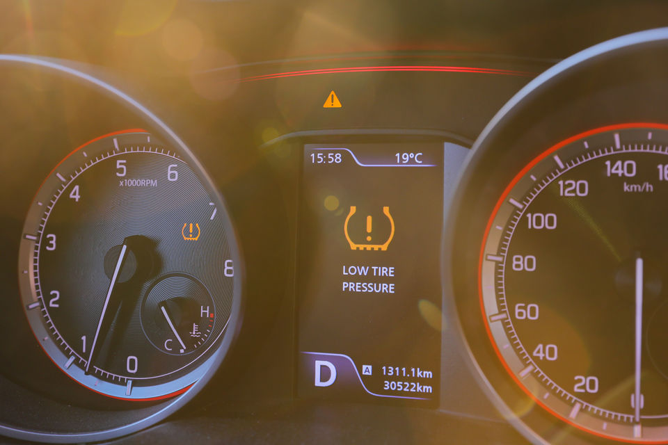 Low tyre pressure warning light shown on car dashboard
