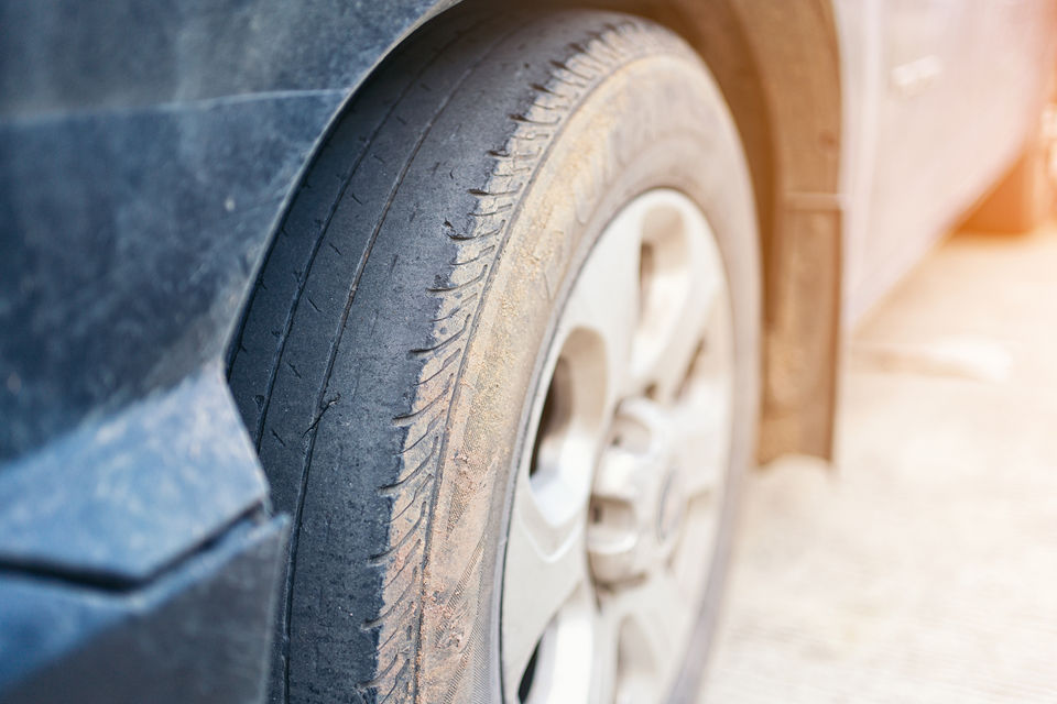 A worn-out tyre with minimal tread remaining