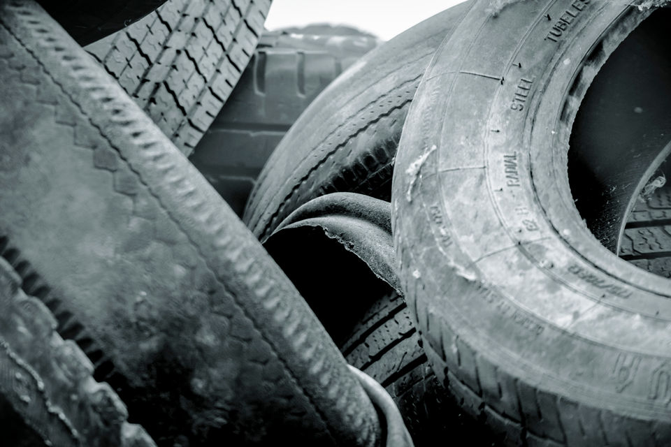 Old tyres with uneven wear on their tread