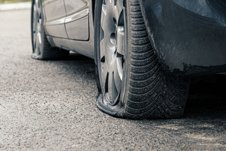 Punctured run flat tyres on the road