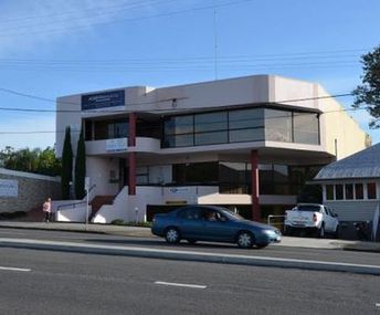 Offer To Purchase  Freestanding 2 Level Commercial Building With Ample Car Parking