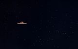 Alien spaceship in the night sky
Translated by «Yandex.Translator»