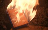 A book with Jewish religious texts spontaneously ignites