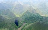 In an aerial photo from April 19, 2020, "Tiankeng", a giant karst sinkhole, in the Global Geopark Lei-Fengshan /Guangxi Zhuang Autonomous Region, Southern China/