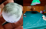 Una pelota de ping pong iluminada por una linterna.Foto del experimento de Eugene radziwil sobre el disparo de la "Luna" con el Teléfono inteligente Galaxy S21 Ultra.