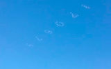 In 2012 the artist with a bachelor of natural Sciences made a performance, writing in the sky the first 1000 digits of PI with a few planes, equipped with special devices for drawing clouds of artificial smoke. The official video of this action, as well as a detailed description of its message posted on the website of a group of artists, engineers and scholars ILLUMINATE THE ARTS (ITA), who participated in the performance. 
Translated by «Yandex.Translator»