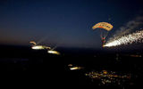 American paratroopers launched fireworks during a jump
Translated by «Yandex.Translator»