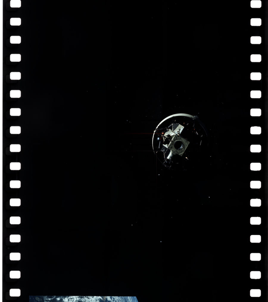 Photo AS12-50-7327, taken shortly after the start of the unpacking process of the lunar module. The adapter was still located next to the Apollo 12 command module.