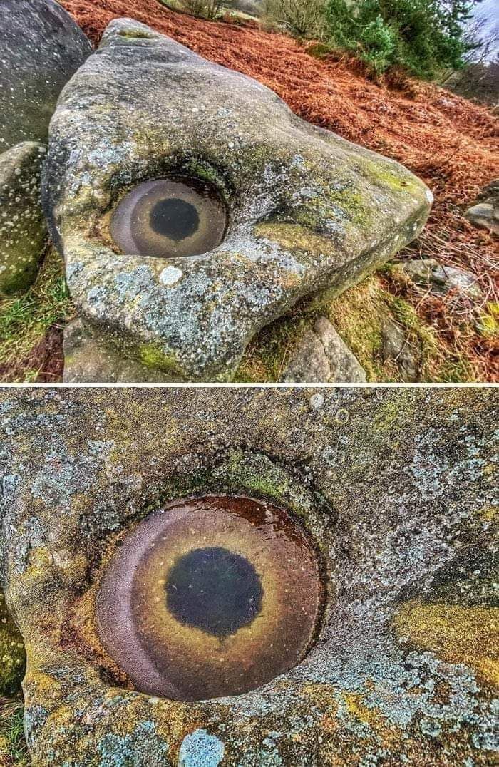 The recess with water in the stone resembles an eye