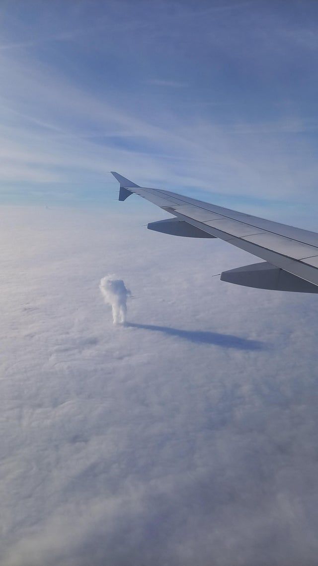 Steam from the nuclear power plant breaks through the clouds (Nogent-sur-Seine, France)