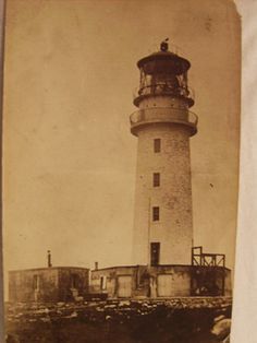 A postcard from the early 1900s showing the Flannan Islands lighthouse.