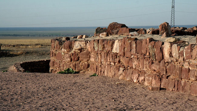 Akyrtas

This Palace complex was built in the VIII–IX centuries. on the territory of Zhambyl region. The Palace was built from multiton stone blocks dark red color.

It is unclear how ancient builders managed to connect the stone slabs between them. Therefore, there is a version that Akyrtas was built by aliens. It supposedly says the fact that over the ruins of structures is often observed a UFO.

And yet many people on site of Akyrtas experience strange sensations. Some feel heat in the limbs, others worsen eyesight and hearing, at the third there is a feeling of physical and mental recovery, the fourth fall into a state akin to a trance, my fifth starts the dizziness and nausea, hallucinations sixth visit...

The local population believes that everything is a manifestation of supernatural forces. Although scientists believe that visitors influence the processes occurring in the bowels of the earth under the earth here huge gaping voids, and such places are always considered abnormal.
Translated by «Yandex.Translator»