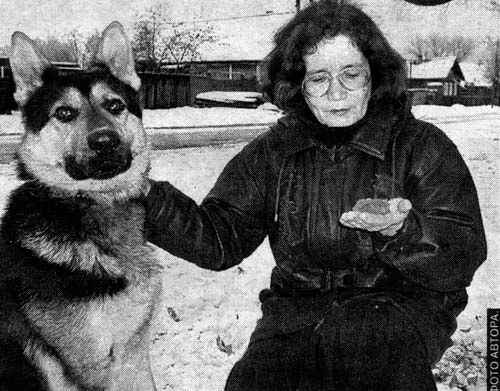 Nina Mikhailovna Veselova with an object and her dog Chuck
 