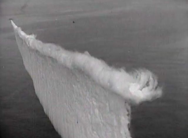 In these 1920s photos, you can see a bomber setting a special smoke screen with a cast of smoke that hides the ship from view during a U.S. Navy exercise.As you know, smoke screens are used in two main cases: to blind enemy troops or to mask their troops.