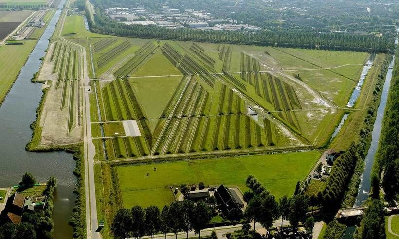 But Schiphol, located in a valley, has no natural hills or around other denoising of natural objects. In order to solve this problem the airport management turned to the team of engineers, architects and designers. The result of their collaboration was a unique Park built to the South-West of the airport.

A series of artificial hills with a height of 2 meters arranged in such a way that they dampened the noise waves coming from the runways. Engineers have calculated the optimum distance between hills for effective acoustic absorption, which reached 10 meters, and the total number of such barriers had been erected 150. In addition, there were several water channels, which are also designed to combat the spread of noise over long distances.

Unusual Playground with artificial hills and channels were designed in the form of the Park, which was named Buttshot. Here there are walking and bike paths, planted trees.
Translated by «Yandex.Translator»