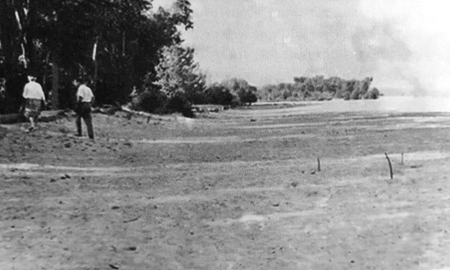 The landing place.The location of the landing site relative to the car. The car was parked where sticks were sticking out of the sand. On the left is a path leading to the forest where the ship supposedly landed.