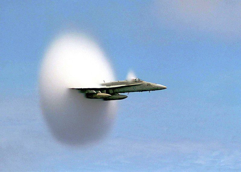 FA-18. You can see a cloud of condensation formed as a result of local pressure changes (the Effect of the Prandtl - Glauert). Often, such a picture was erroneously perceived as "breaking the sound barrier".
Translated by «Yandex.Translator»