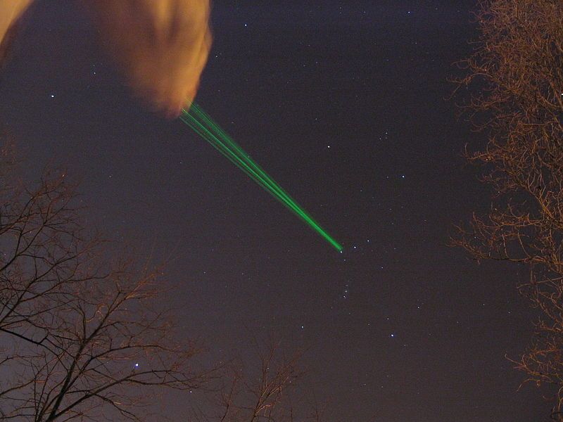 Green laser aimed at the sky.
Translated by «Yandex.Translator»