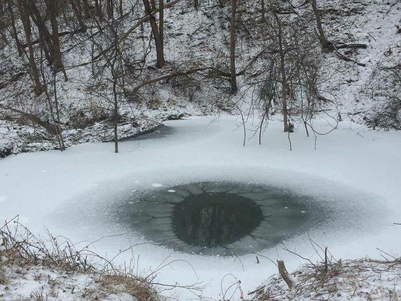 The ice in the pond, similar to the eye.
Translated by «Yandex.Translator»