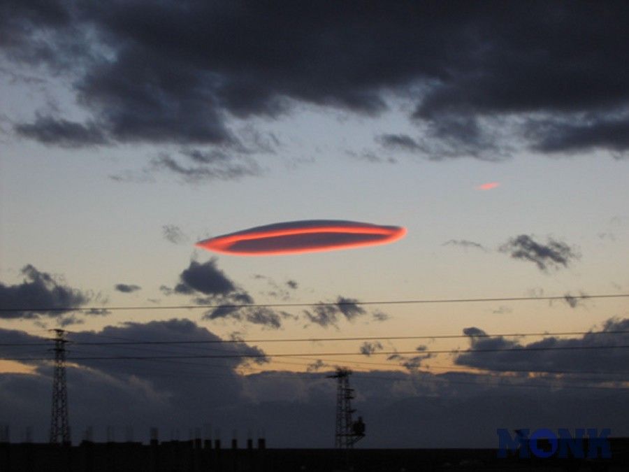 Lenticular (lenticular) clouds.

Formed between the two layers of air do not move, no matter what. Appear behind the mountain peaks.

The altitude of 15-20 km
Translated by «Yandex.Translator»