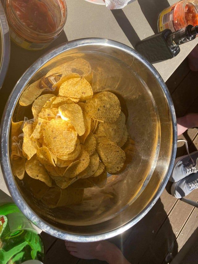 The snack bowl acted as a parabolic mirror and set the chips on firePosted by u/loafers_glory