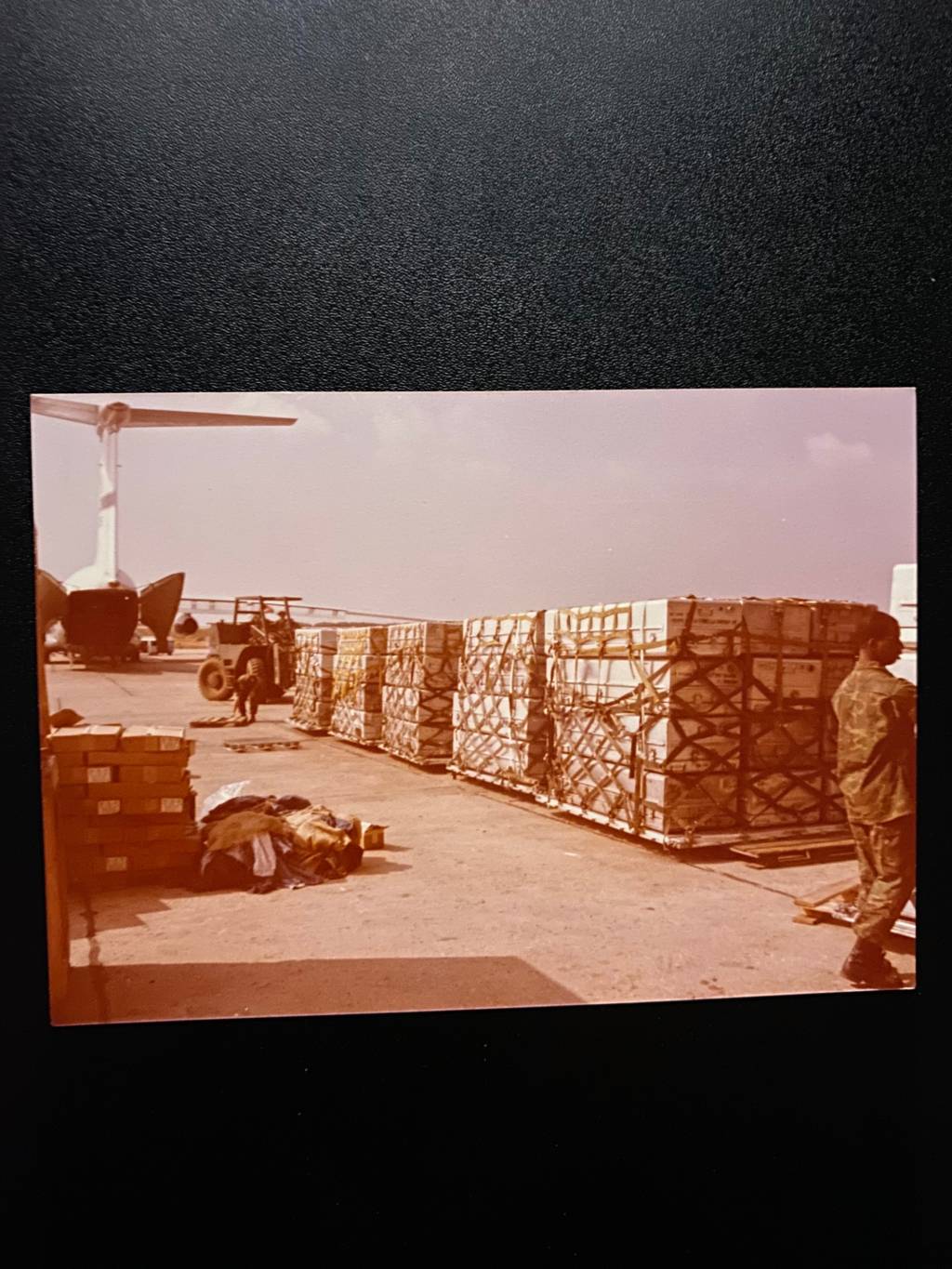 Flag-draped caskets of fallen Marines staged for transport, Beirut 1983