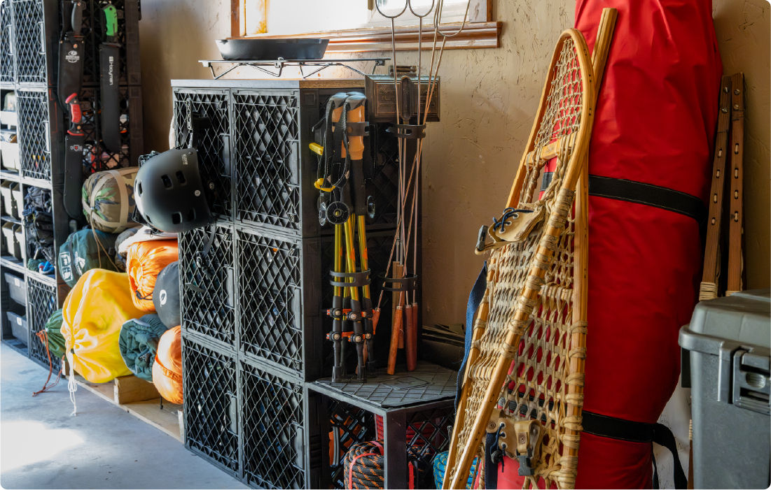 Black CratePlay™ modular crate cabinet with wood tops, coffee gear, dishes, and kitchen storage accessories.