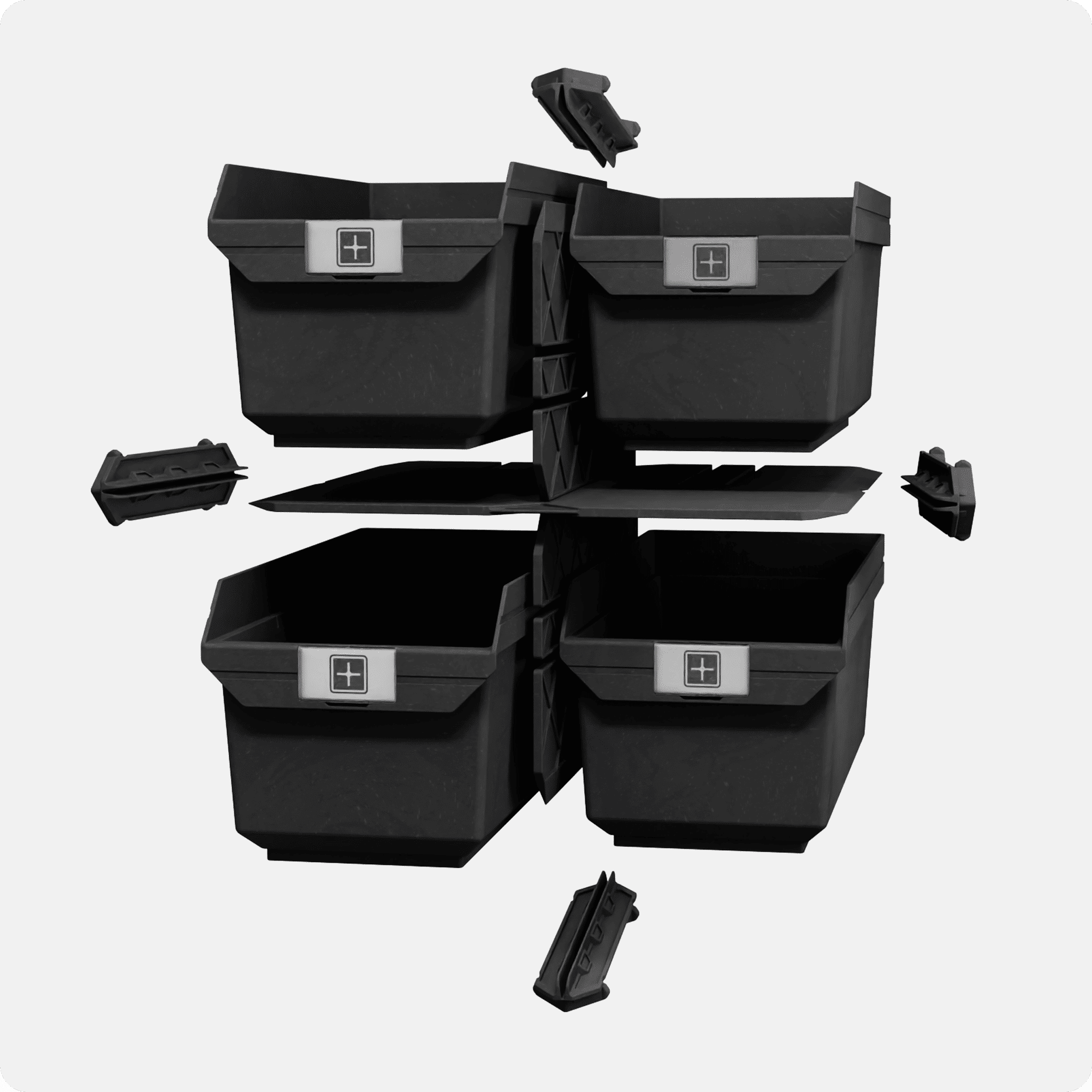 A black 2x2 Outfitter Kit, showcasing the four medium bins, 4 CrateRails, and one 2x2 divider set.