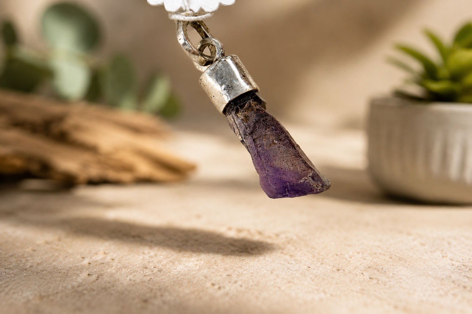 Raw Amethyst in silver cap