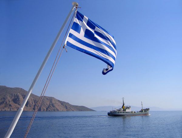 Greece---Flag-and-boat---118367421