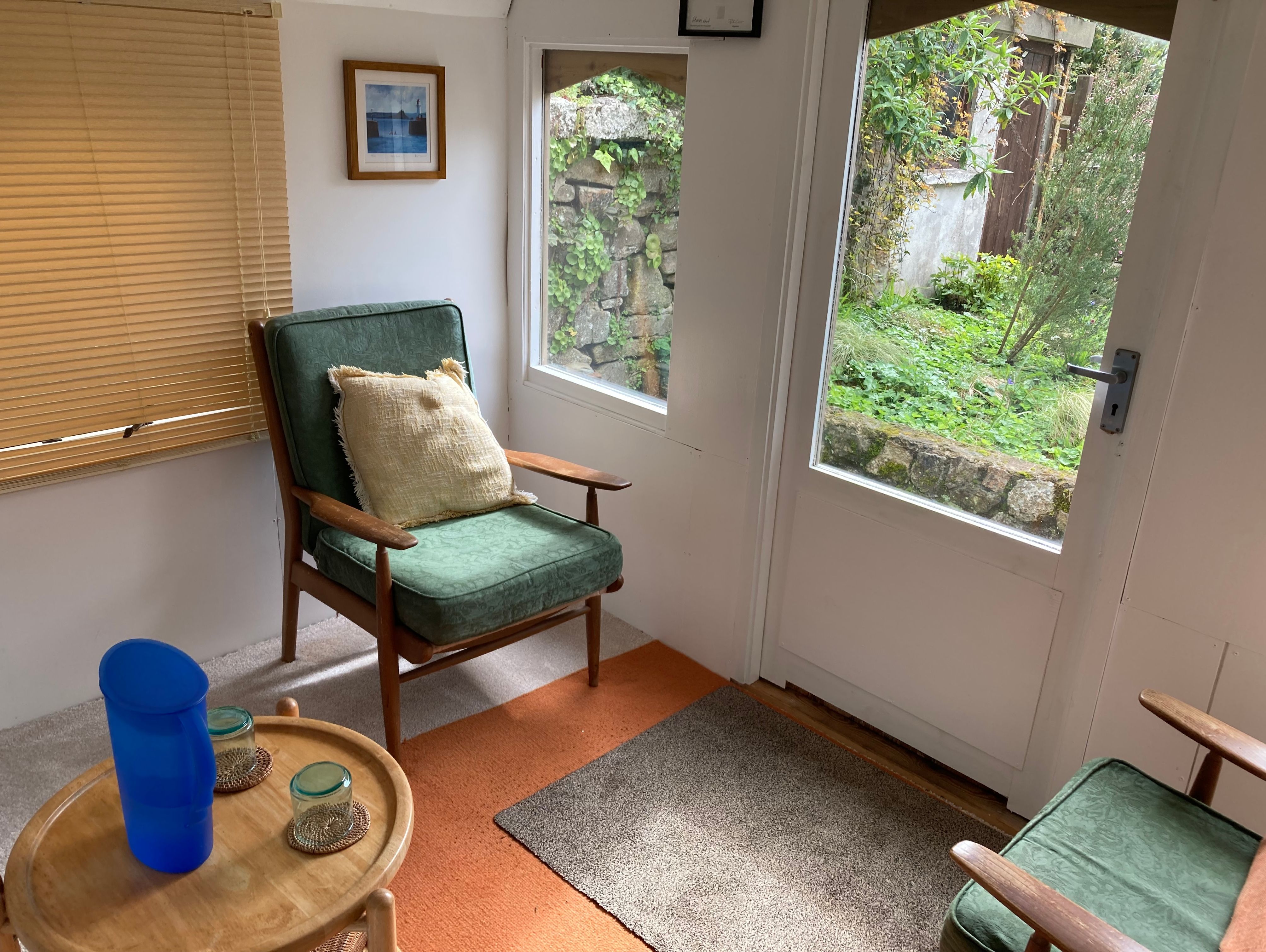 Quiet therapy room in garden courtyard, Gulval Nearby Wellbeing Spaces