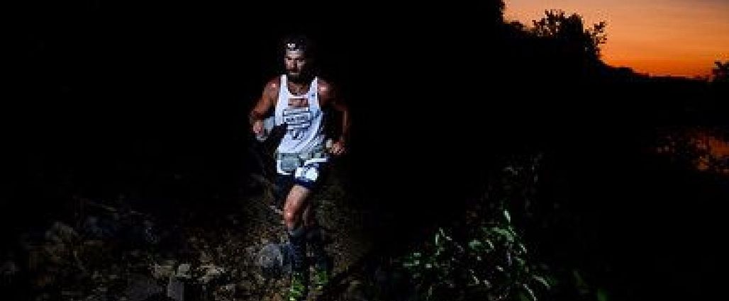 Jeremy Morris, 100 mile winner, on the red trail during the early morning hours.