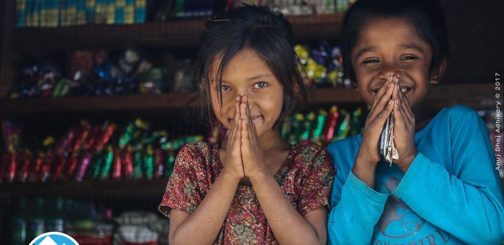 Nepalese children watching the course