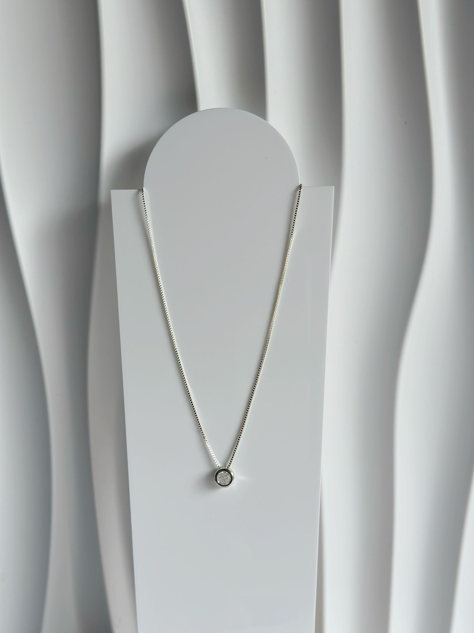 collar punto de luz