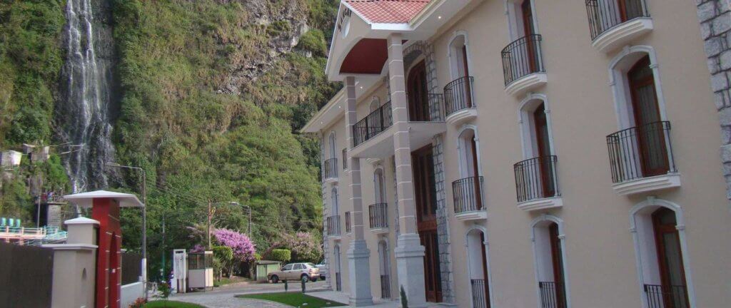 The facade of Sangay Spa facing rugged mountains