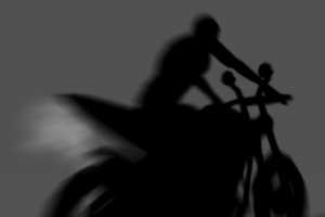 Shadow bike rider