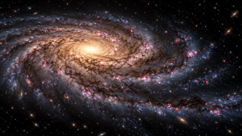 An oblique view of a Milky Way-like spiral galaxy with a bright core, dusty arms, and scattered star-forming regions