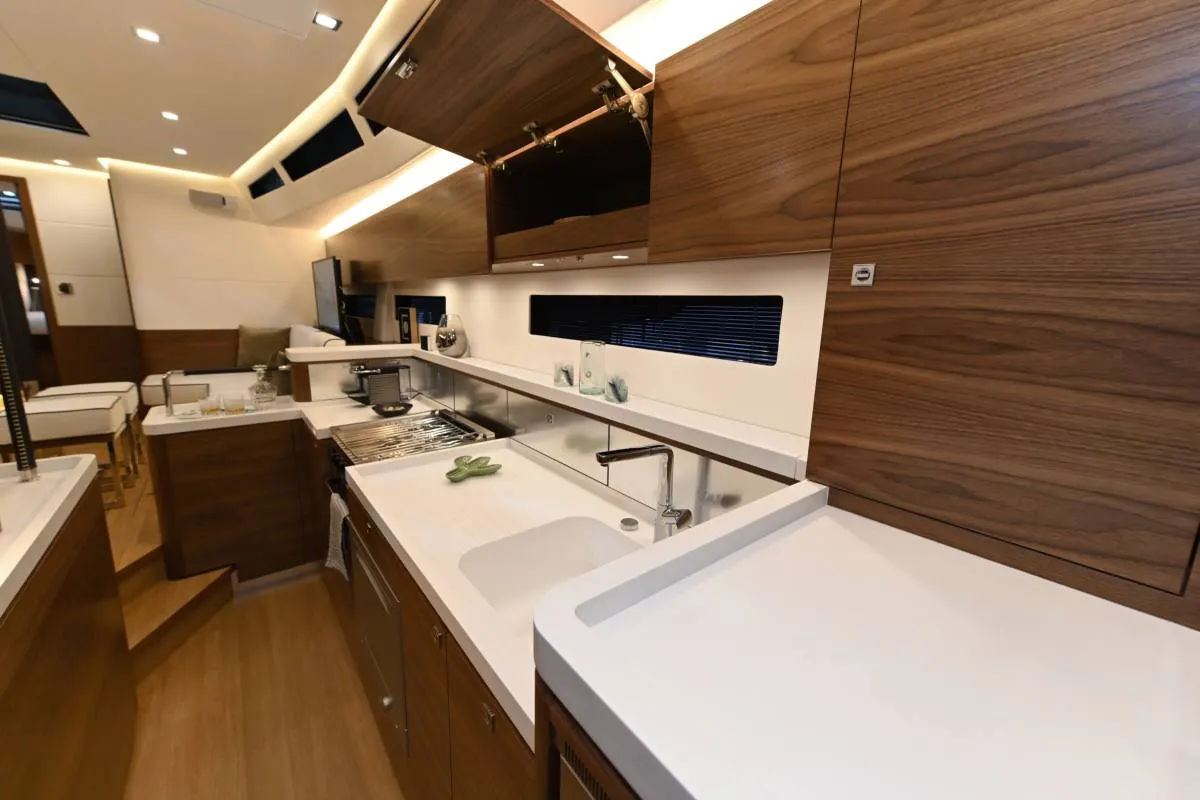 New 2024 Amel Monohull 50ft - Marina del Rey CA AMEL 50 silk matt American walnut galley 04 photo T Luenen