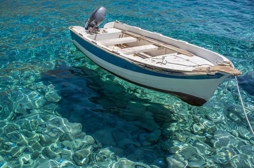 boat in clear water loutro crete boat in clear water loutro crete