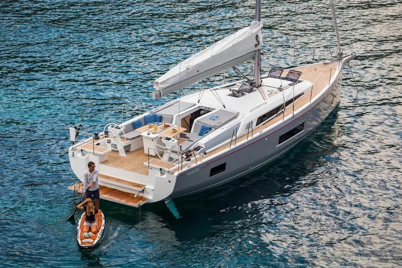 Couple enjoying a sunny day on a sailing yacht near Los Angeles. Couple enjoying a sunny day on a sailing yacht near Los Angeles.