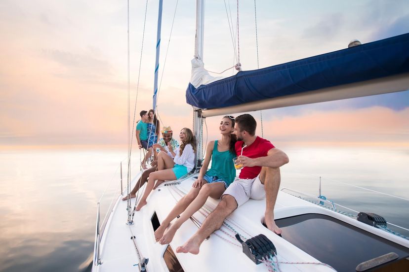 young people sitting on yacht young people sitting on yacht