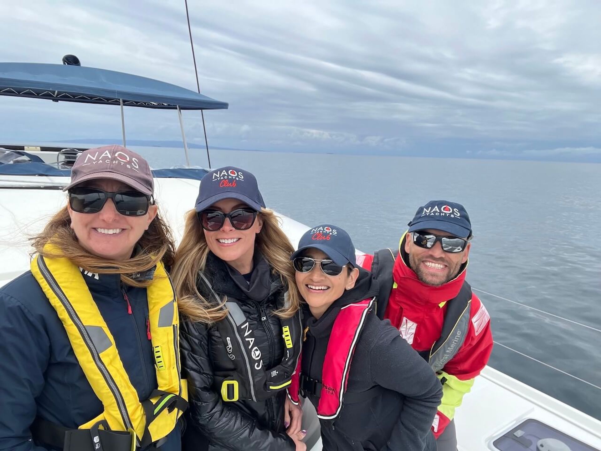 Professional sailing school instructors teaching students