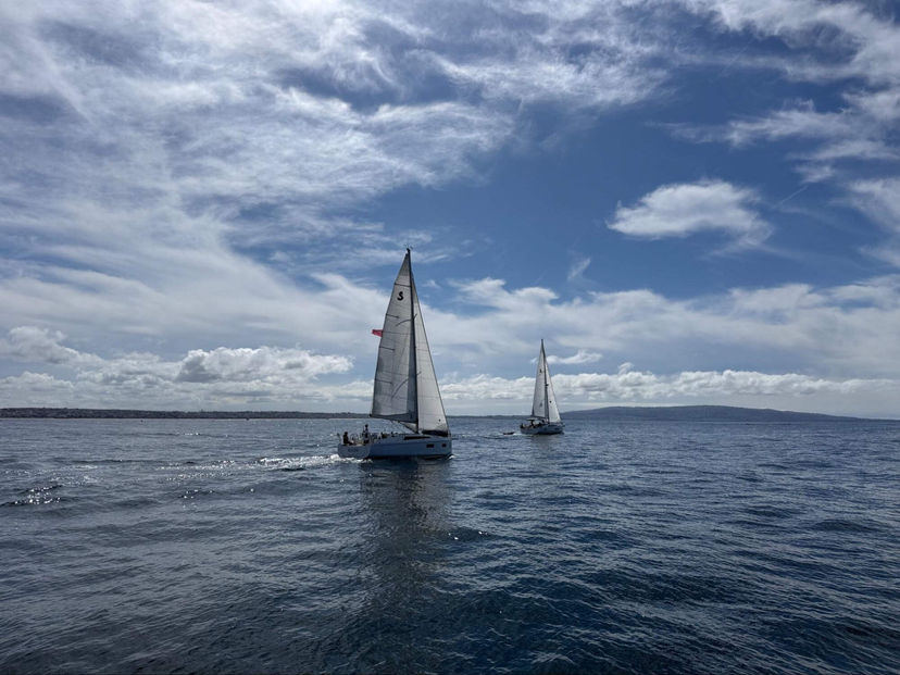 Two vessels approaching in a crossing situation on open water.