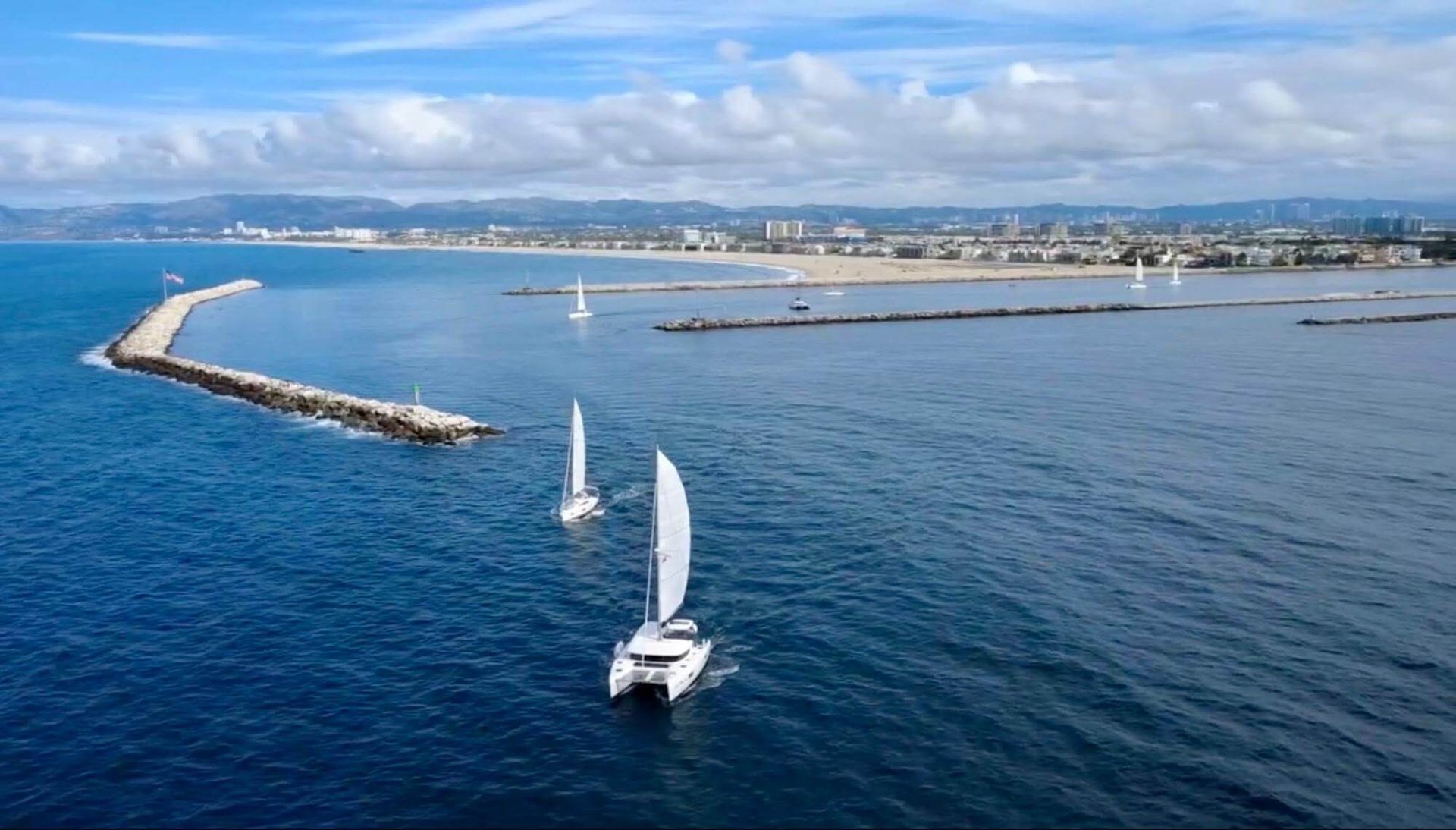 Busy harbor channel where right-of-way and channel rules are critical.