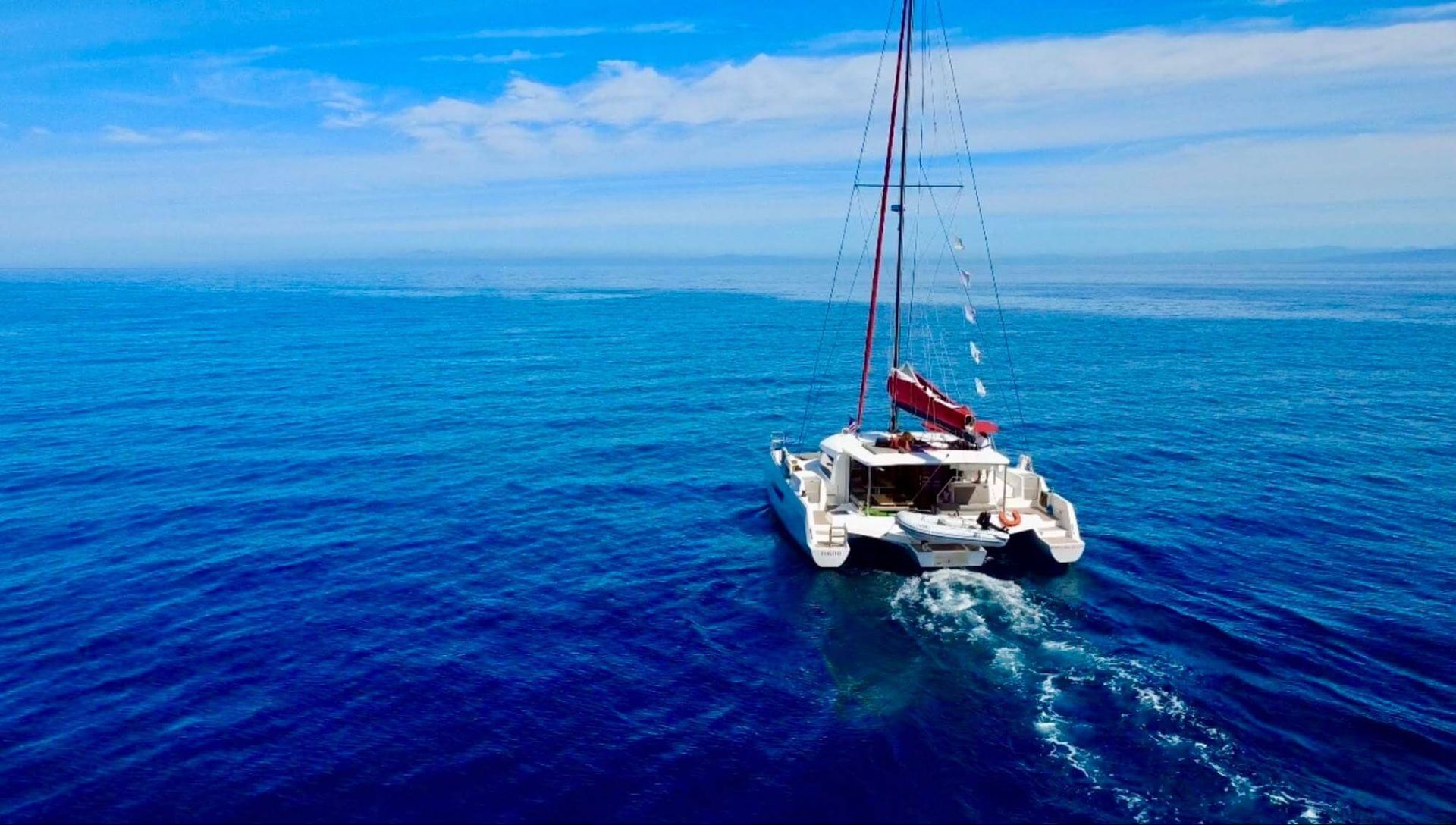 Sailboat navigating coastal waters under USCG navigation rules.