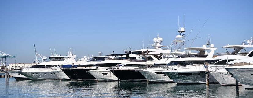 Yacht club in San Pedro with large yachts lined up in a marina.