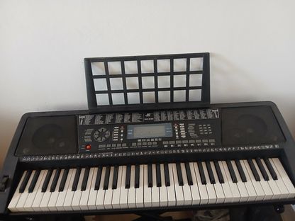 Teclado Mk939 con Soporte y Transformador Incluido 1