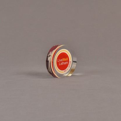 Angle view of 2 1/2" circle acrylic embedment with full color image