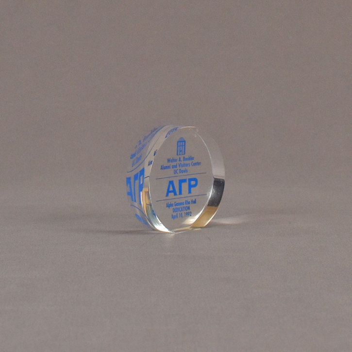 Angle view of 3" circle acrylic embedment with blue image